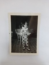 Carnival child harlequin with