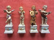 N° 4 putti angioletti musicanti in ceramica vedi sigle