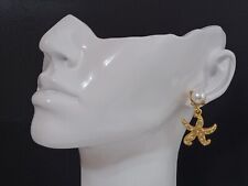 Oscar de la Renta- Boucles d'oreilles "étoile de mer" or avec des perles .