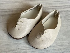 Scarpe in pelle color crema