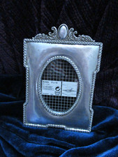 Foto ovale in cornice