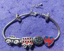 BRACCIALE PANDORA CON 4 CHARMS