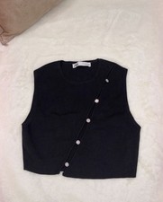 Top corto con diamanti laterali davanti