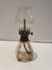 Antico lume ad olio in vetro