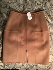 Kiton, Italia $ 3.400. Gonna