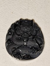 Ciondolo amuleto in ossidiana nera con intaglio figura di drago