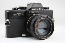 Minolta SRT MC con fotocamera