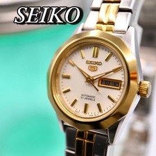 Orologio da polso da donna SEIKO carica manuale argento oro data modello 1350...