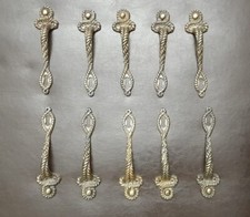Lotto 10 antiche maniglie in bronzo