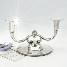 Candelabro antico in argento