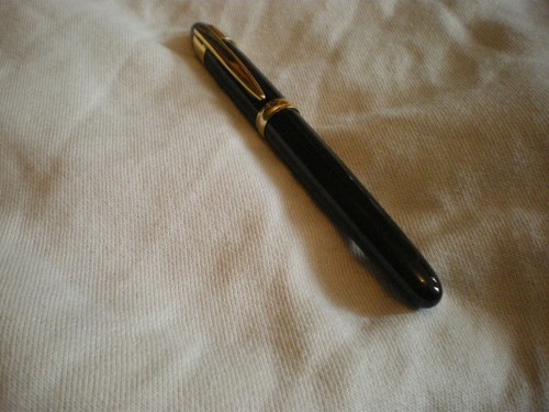 Pluma estilografica con - con, un