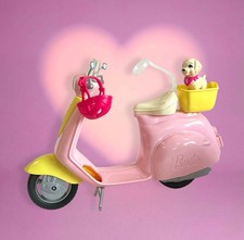 Barbie rosa ciclomotore