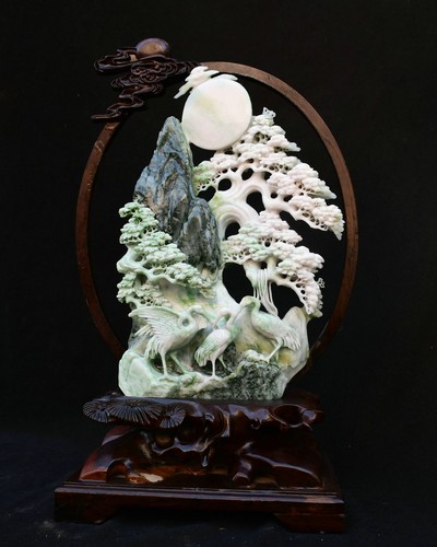 Scultura uccellino gru albero