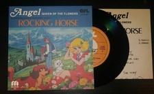ANGEL / MYSHA. ROCKING HORSE