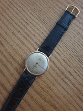 Magnifique montre Enicar en or