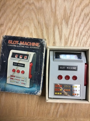 1971 handheld slot machine - machine, in