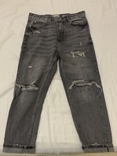 jeans neri strappati Modello Relaxed