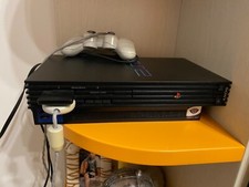 Playstation con joystick e