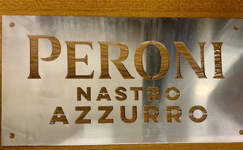 Insegna pubblicitaria - , in