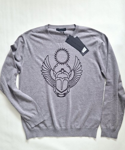 Maglione nuovo con etichette
