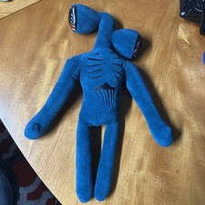 Peluche testa sirena blu - di,