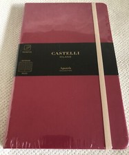 Quaderno rigido con righe 13x21 cm in rosa lampone di Castelli Milano