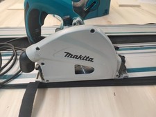 Makita SP6000J1 1300W 165mm Sega Circolare ad Affondamento + 2 Guide E Morsetti