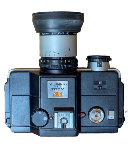 Minolta 110 zoom - zoom, (marca