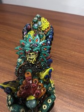 Statuina giaguaro colorato