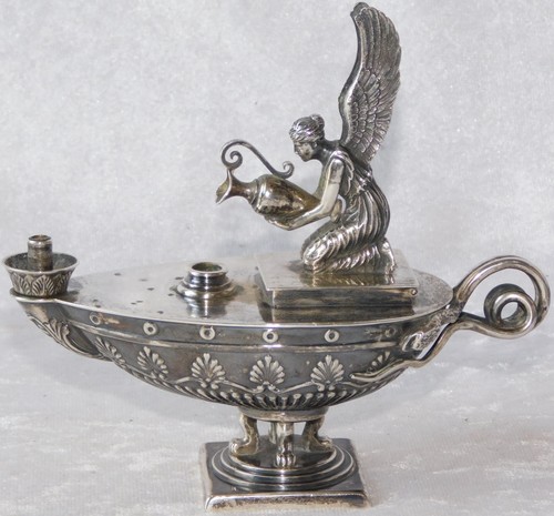 Antica lampada olio