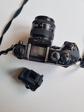 Nikon F4 con battery pack MB-21 e zoom Nikkor AF 35-70 f3.3-4.5 