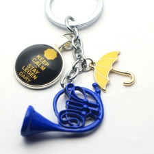 Portachiavi TV How I Met Your Mother HIMYM giallo ombrello madre corno francese blu