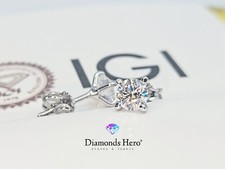 Orecchini punto luce 18K con