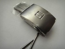 Fibbia pieghevole deployante