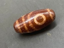 Raro ciondolo amuleto perline