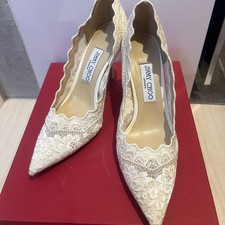 Decolte Jimmy Choo pizzo