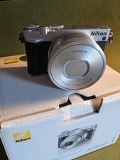 Nikon 1 J5 con obiettivo VR 10-30mm, testato, 3738 click