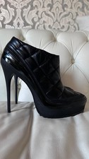 Autentici stivaletti Burberry