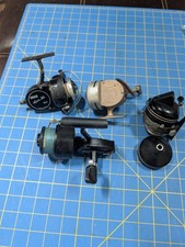 Lotto 4 mulinelli da pesca Zebco 606 spin flo 822 Southbend 70 Garcia Mitchell 300 pezzi
