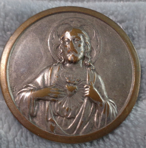 Antico gettone tascabile