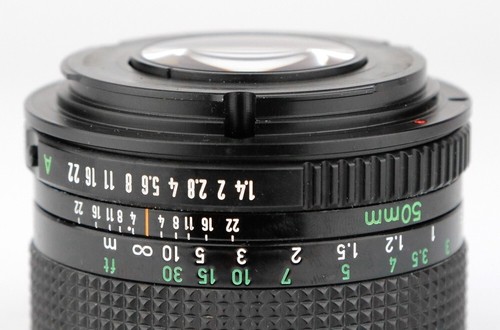 Canon 100 2 8 - 50/1.4, 100/2.8