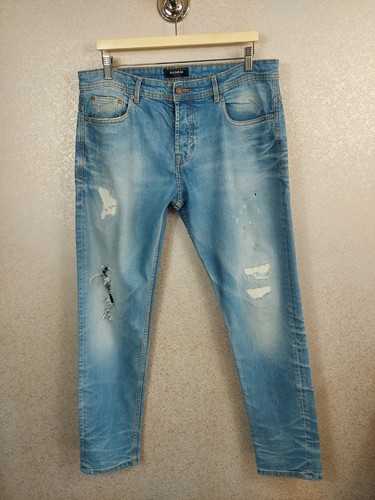 Jeans skinny strappati uomo