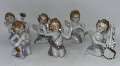Statuine porcellana cherubino