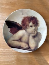 Piatto in porcellana cherubino