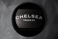 Copricerchio Chelsea Truck Co. con scritta specchio per Jeep Wrangler JL 2018+