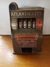 Slot machine giocattolo vintage Atlantic City Bonanza Bank fronte metallo fuso braccio mancante