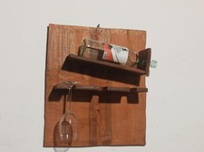 portabottiglie vino da parete, realizzato con materiale di recupero