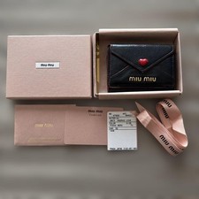 portafoglio miu miu triplo