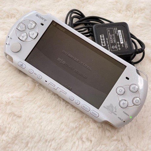 Caricabatteria console psp - caricabatteria,