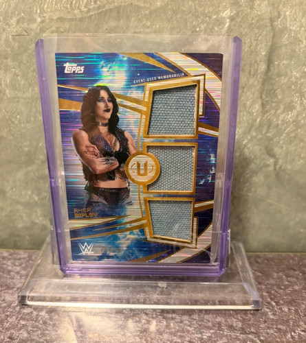 Rhea ripley triple superstar - rhea,
